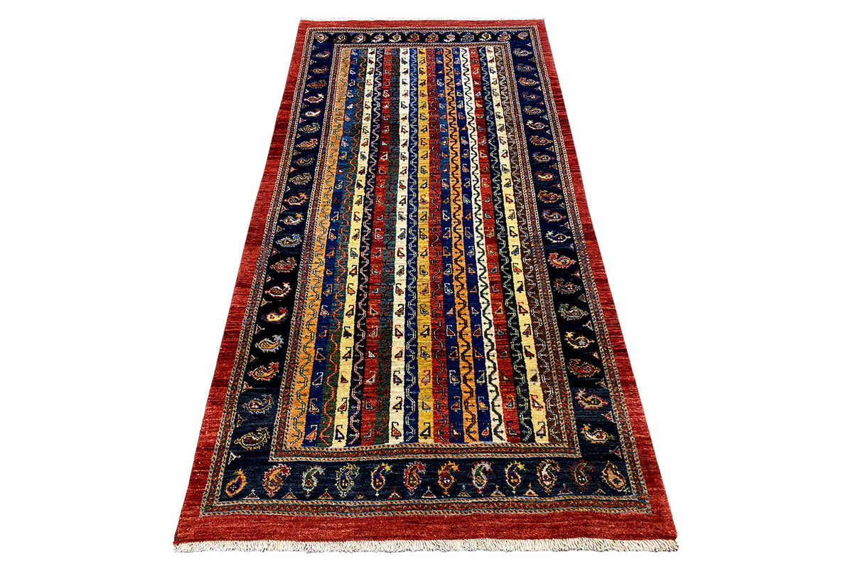 Oriental rug in a striped pattern, dark blue field with red borders, 193x101 cm