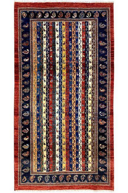 Oriental rug with a medium medallion and stripe pattern in dark blue and red