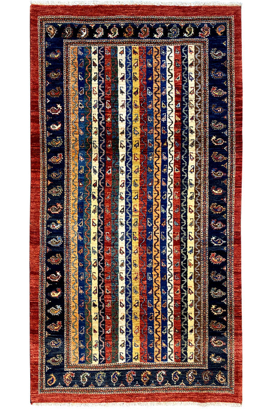 Oriental rug with a medium medallion and stripe pattern in dark blue and red