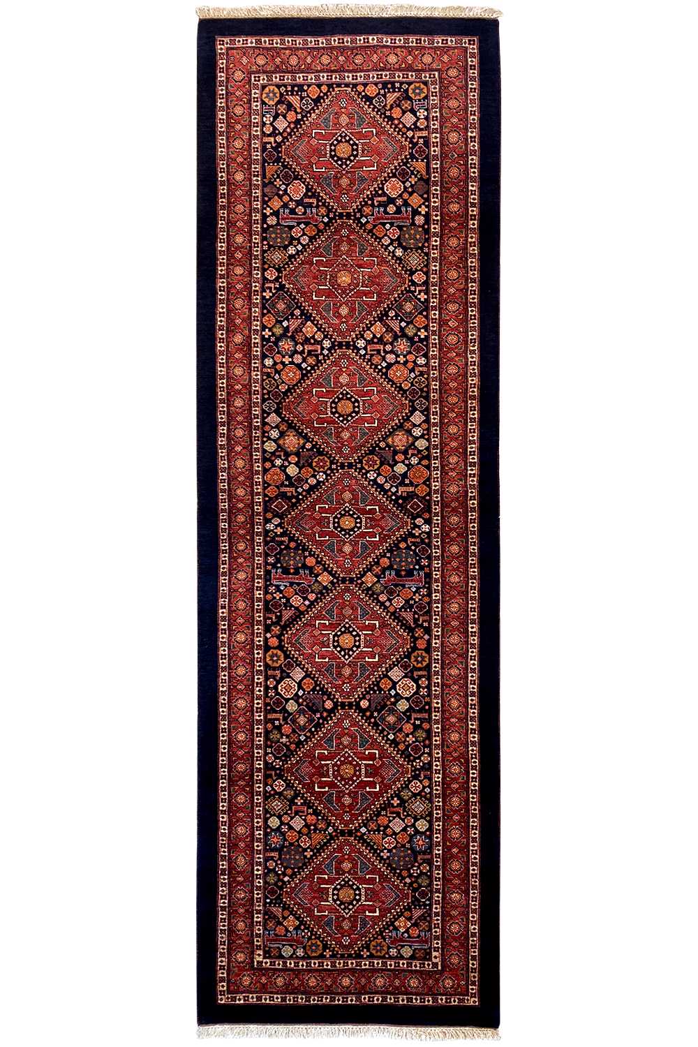 Oriental rug runner with cassette medallions in red, dark blue and gold tones, fringes