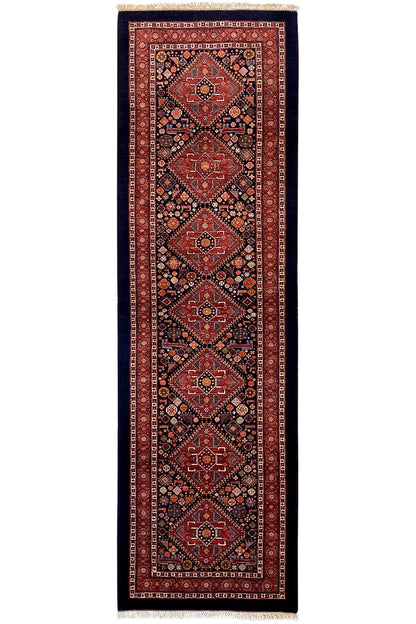 Oriental rug runner with cassette medallions in red, dark blue and gold tones, fringes