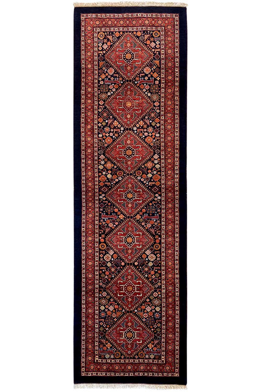 Oriental rug runner with cassette medallions in red, dark blue and gold tones, fringes