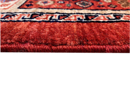 Qashqai exclusive runner rug: close-up of red pile and woven edge with fringe