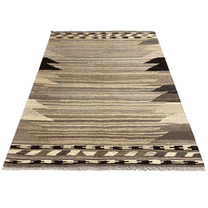 Kilim rug with a centered stripe pattern and dark triangles, rectangular