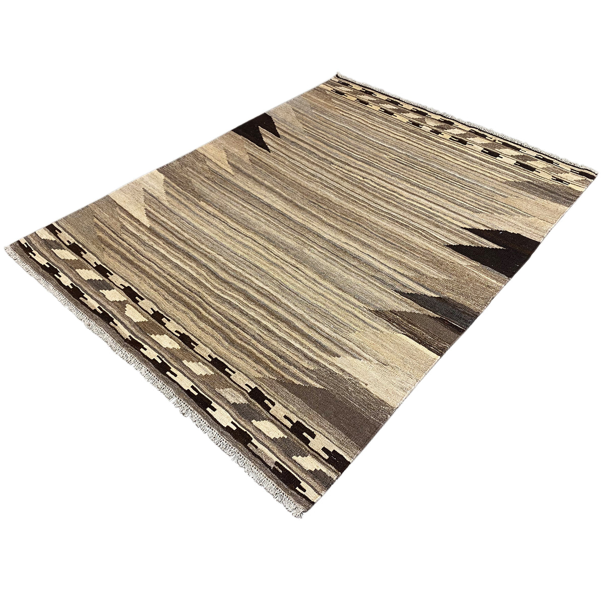 Kilim rug viewed diagonally with a striped look, beige and gray tones, fringes