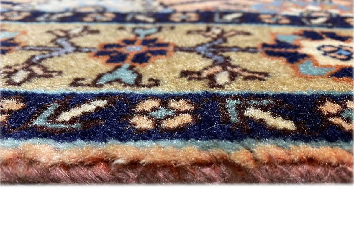Carpet edge with a colored border and fringe, detail of the pile and edge