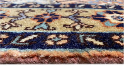 Carpet edge with a colored border and fringe, detail of the pile and edge