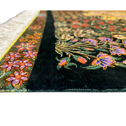 Close-up of a silk carpet: detailed floral pattern on a dark background