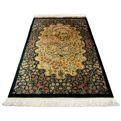 Rectangular silk rug with a large yellow pattern, dark green and red flowers, fringes