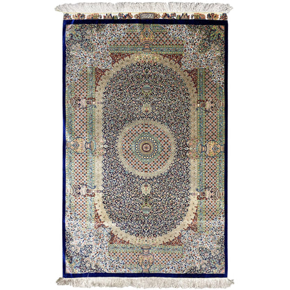 Rug 156x102 cm with medallion pattern, blue border and fringes