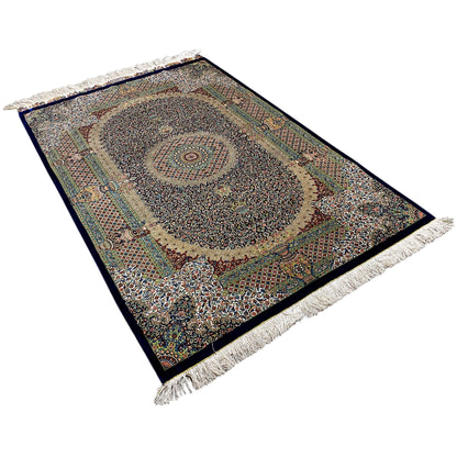 Rug 156x102 cm, diagonal view; dark blue-green ornamental style, fringe
