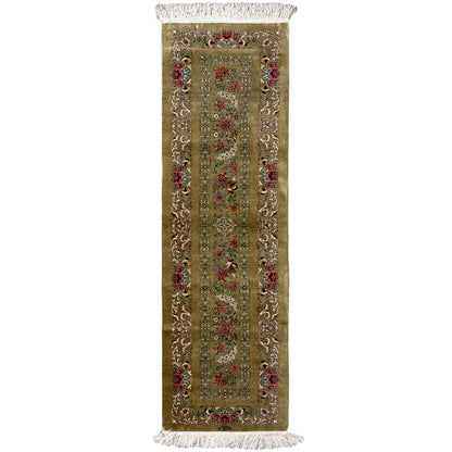 Silk rug as a narrow runner in olive with a medallion pattern and fringes at the ends