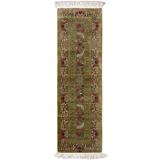 Silk rug as a narrow runner in olive with a medallion pattern and fringes at the ends