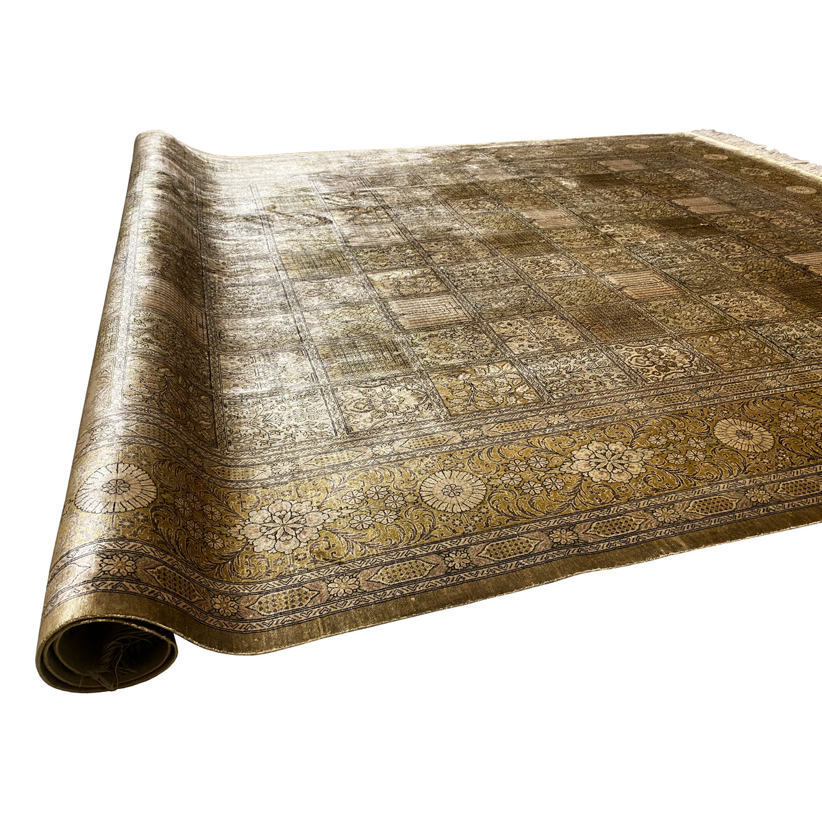 Rolled-up carpet view, brown patchwork ornament, light lines and fringes
