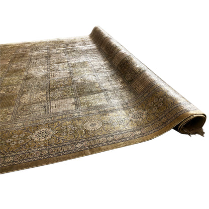 Rug from an angled perspective, brown-beige ornamental fields, twisted edge fringes