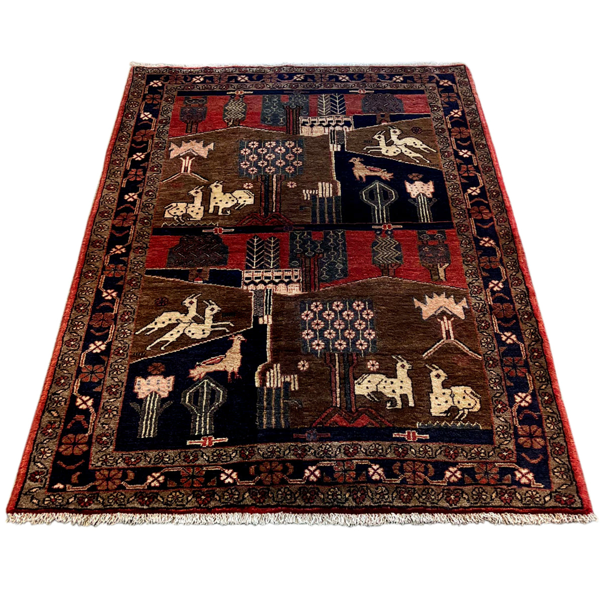Rectangular oriental rug with animal and ornamental elements, brown with red and blue accents
