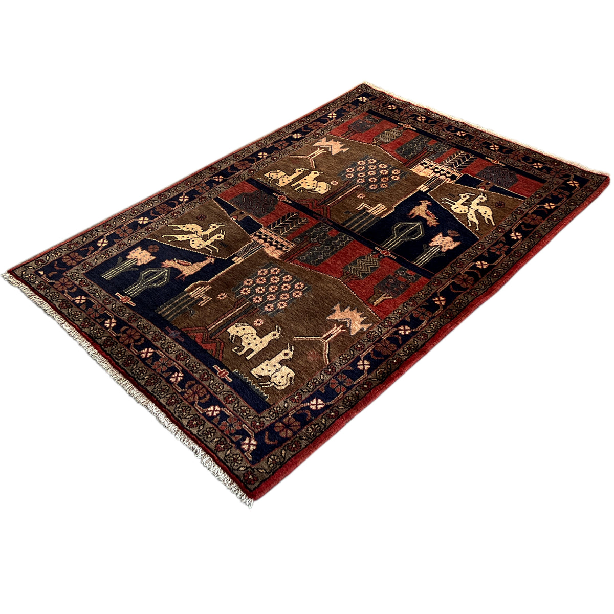Rug with a decorative border, patchwork design in brown, red and dark blue