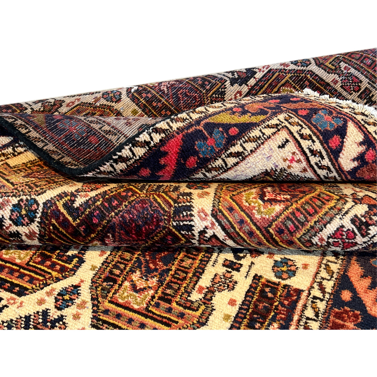 Shahre Babak rug (154x105 cm), fabric surface with relief folds and a colorful pattern
