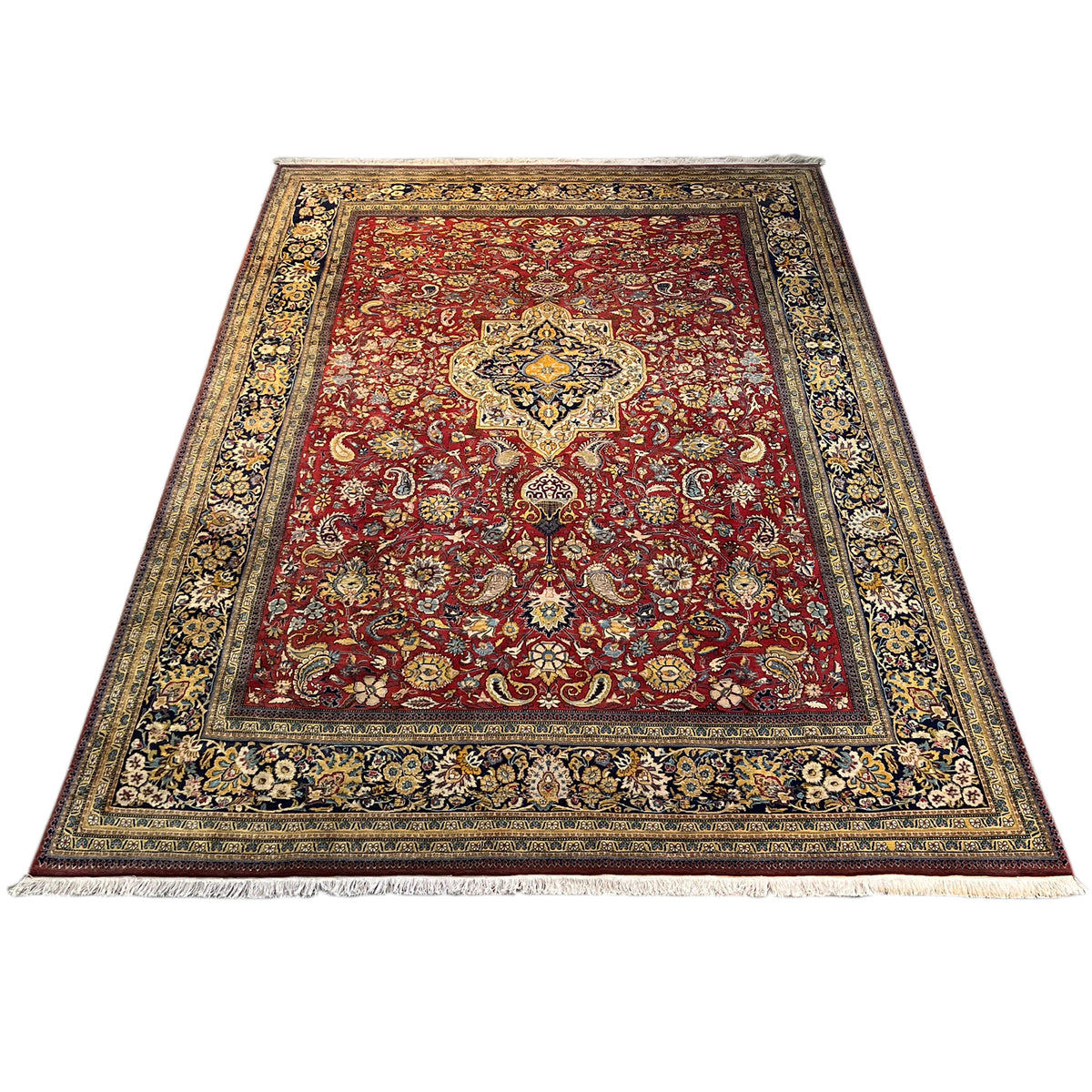 Shahreza rectangular rug, red pile with an ornamental medallion in a blue-and-gold frame