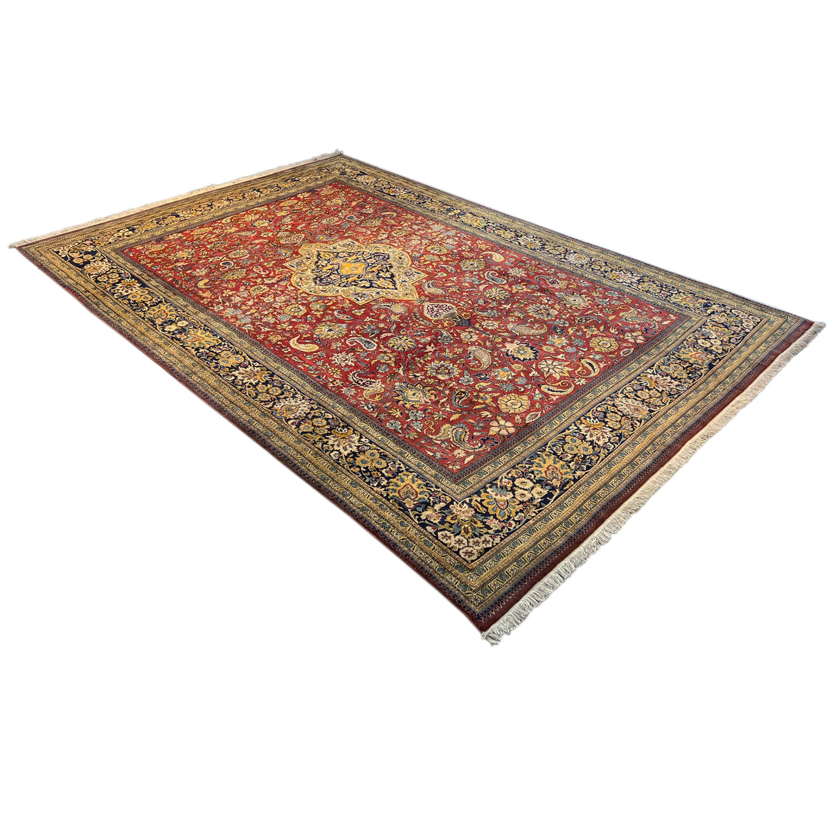Shahreza carpet viewed from above, red pattern with a medallion and blue-and-gold borders