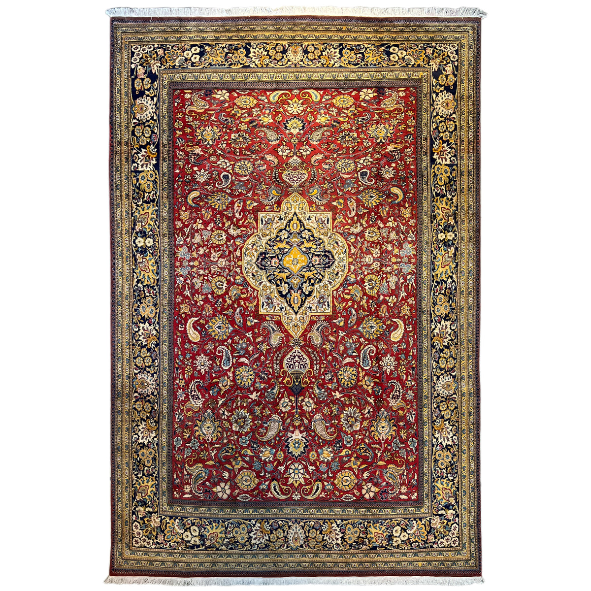 Shahreza rug with a red, blue-and-gold ornamental pattern and a wide decorative border