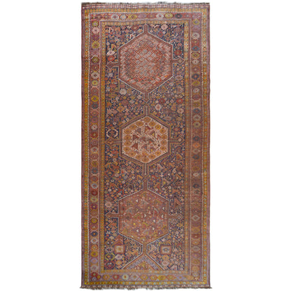 Oriental rug with an ornamental pattern in rust red, blue and yellow, 455x194 cm