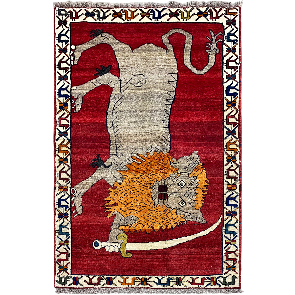 Rug with a red border and a central animal motif in gray and orange