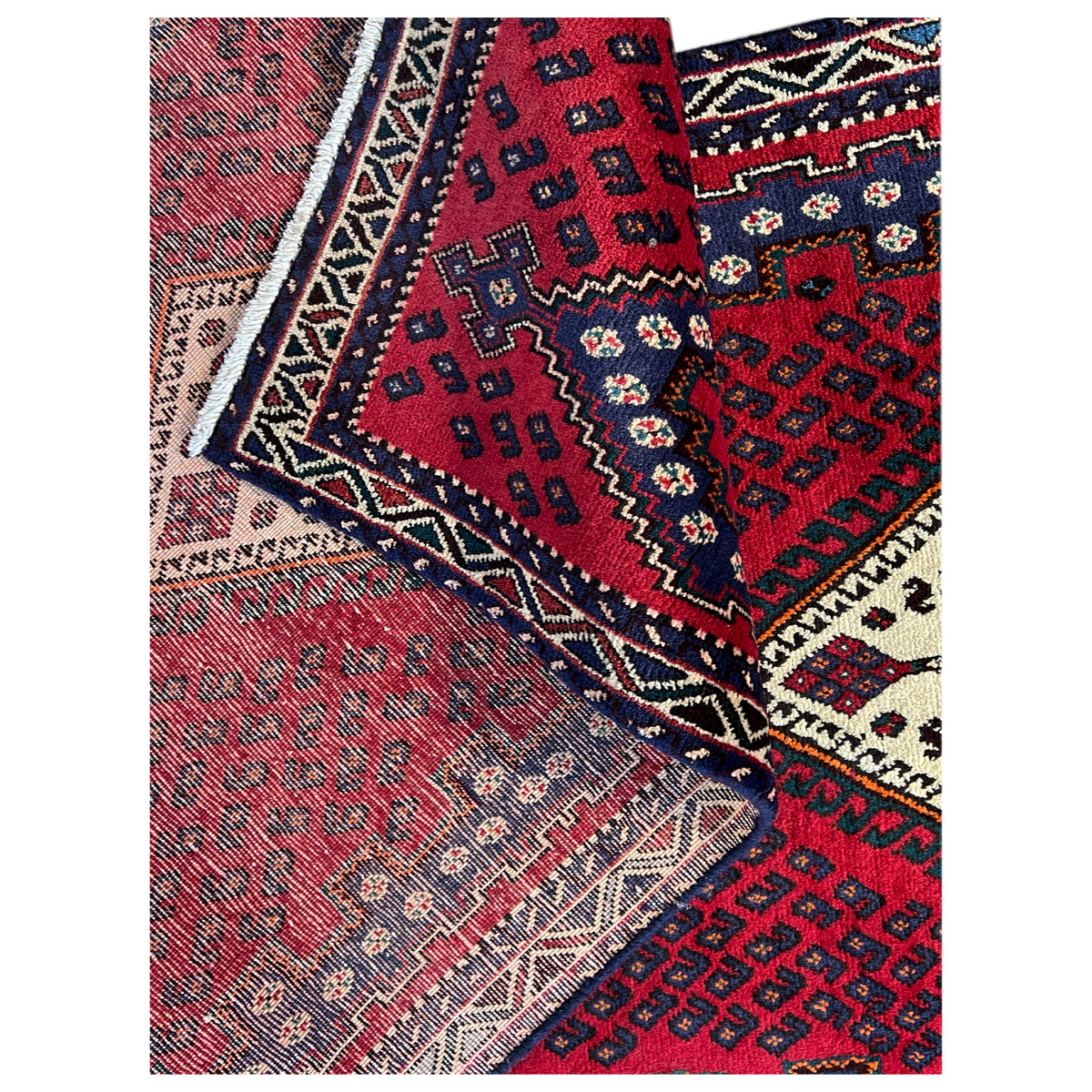 Close-up: red runner rug with an oriental pattern and contrasting border