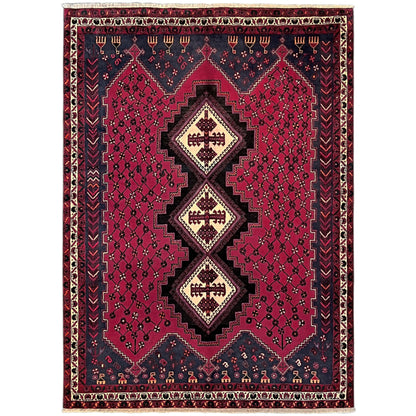 Sirjan rug with a red pattern and dark blue border, centrally embedded medallions