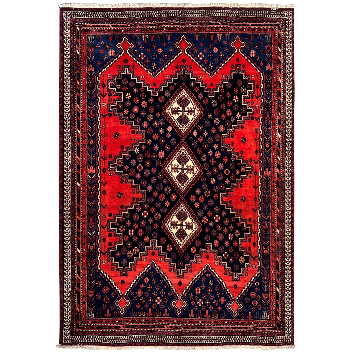 Oriental rug with red, blue, and black diamond patterns, rectangular, woven