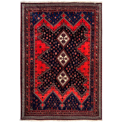 Oriental rug with red, blue, and black diamond patterns, rectangular, woven