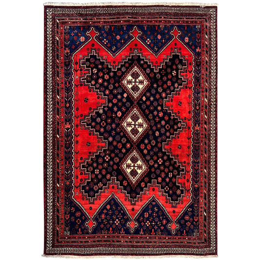 Oriental rug with red, blue, and black diamond patterns, rectangular, woven