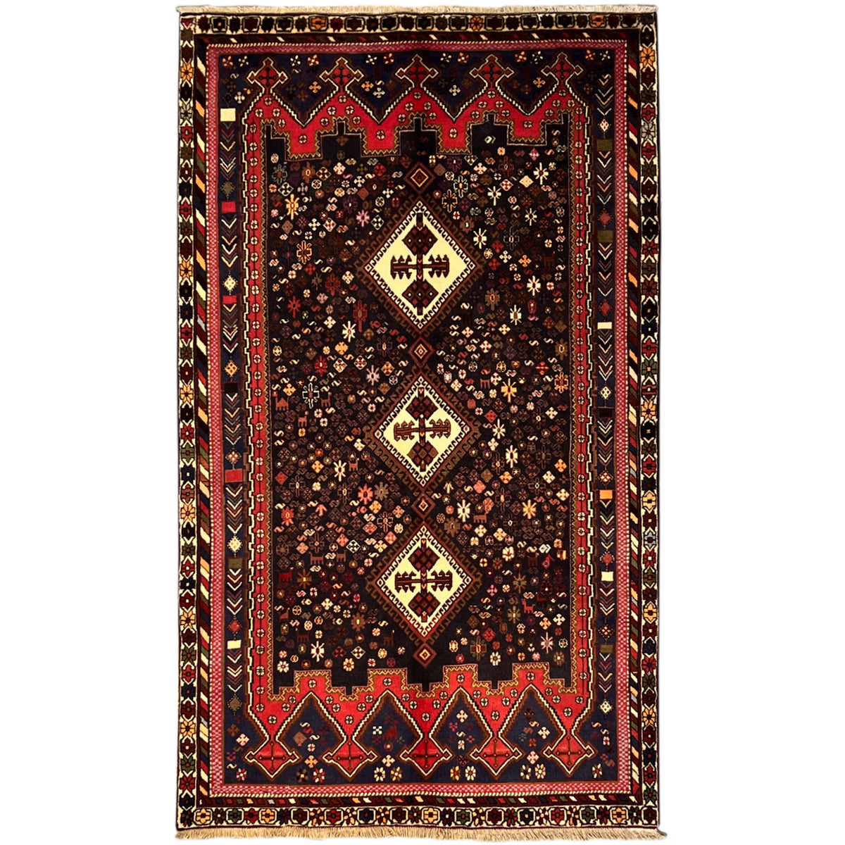 Sirjan rug in dark brown with red-blue ornaments and central medallions, 244x143 cm