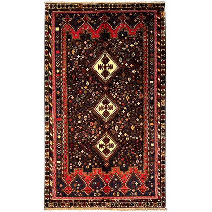 Sirjan rug in dark brown with red-blue ornaments and central medallions, 244x143 cm