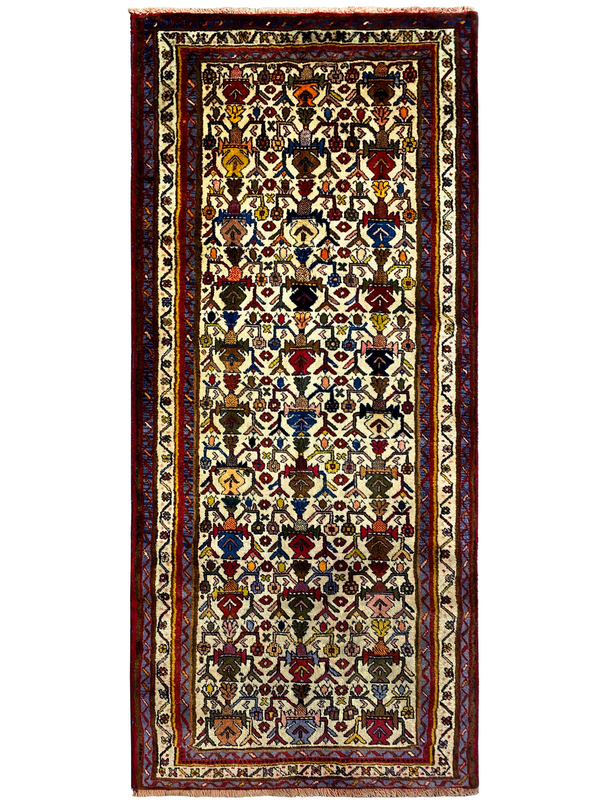 Rectangular Sirjan rug with a dense ornamental design, red borders, and a light background
