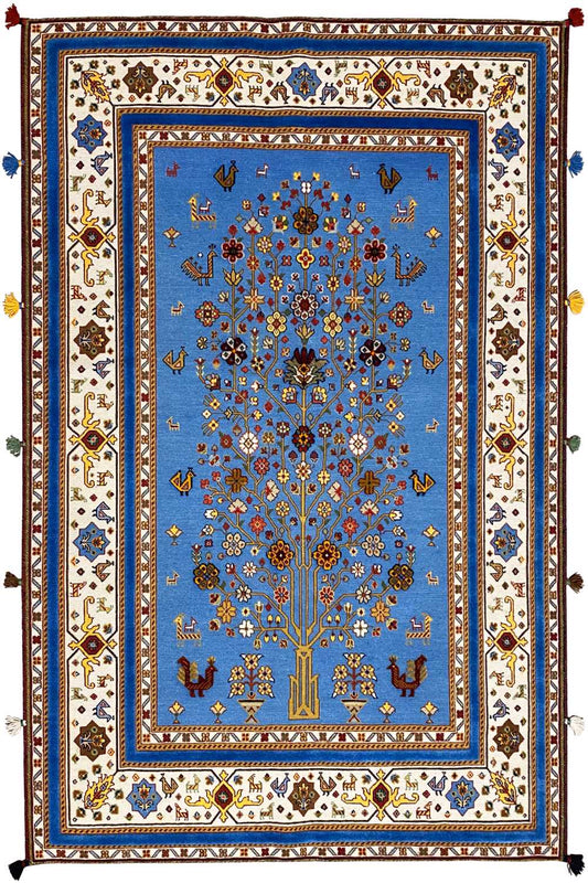 Blue oriental rug with decorative border, central medallion, and fringes
