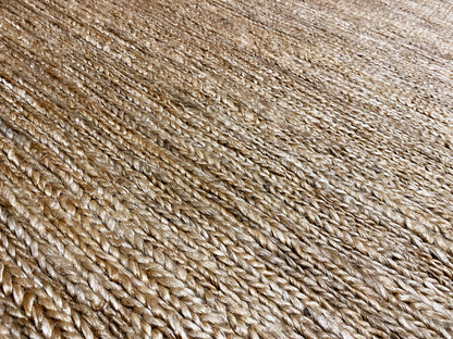 Detailansicht der Gewebestruktur: beiger Fadenmix mit sichtbarer Textur