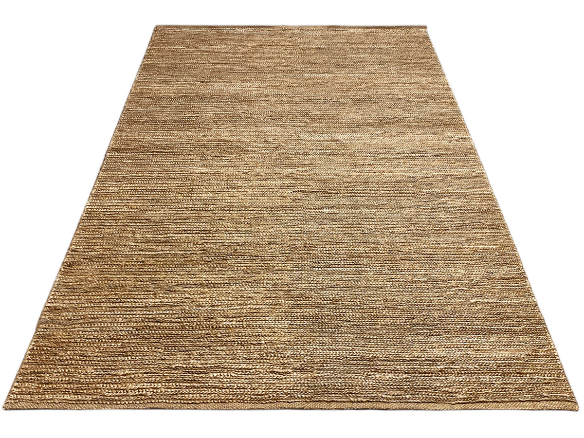 Rectangular rug with a dense, fine weave in warm beige