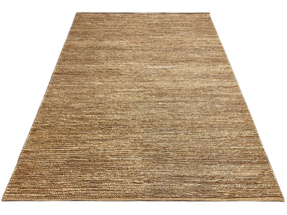Rectangular rug with a dense, fine weave in warm beige