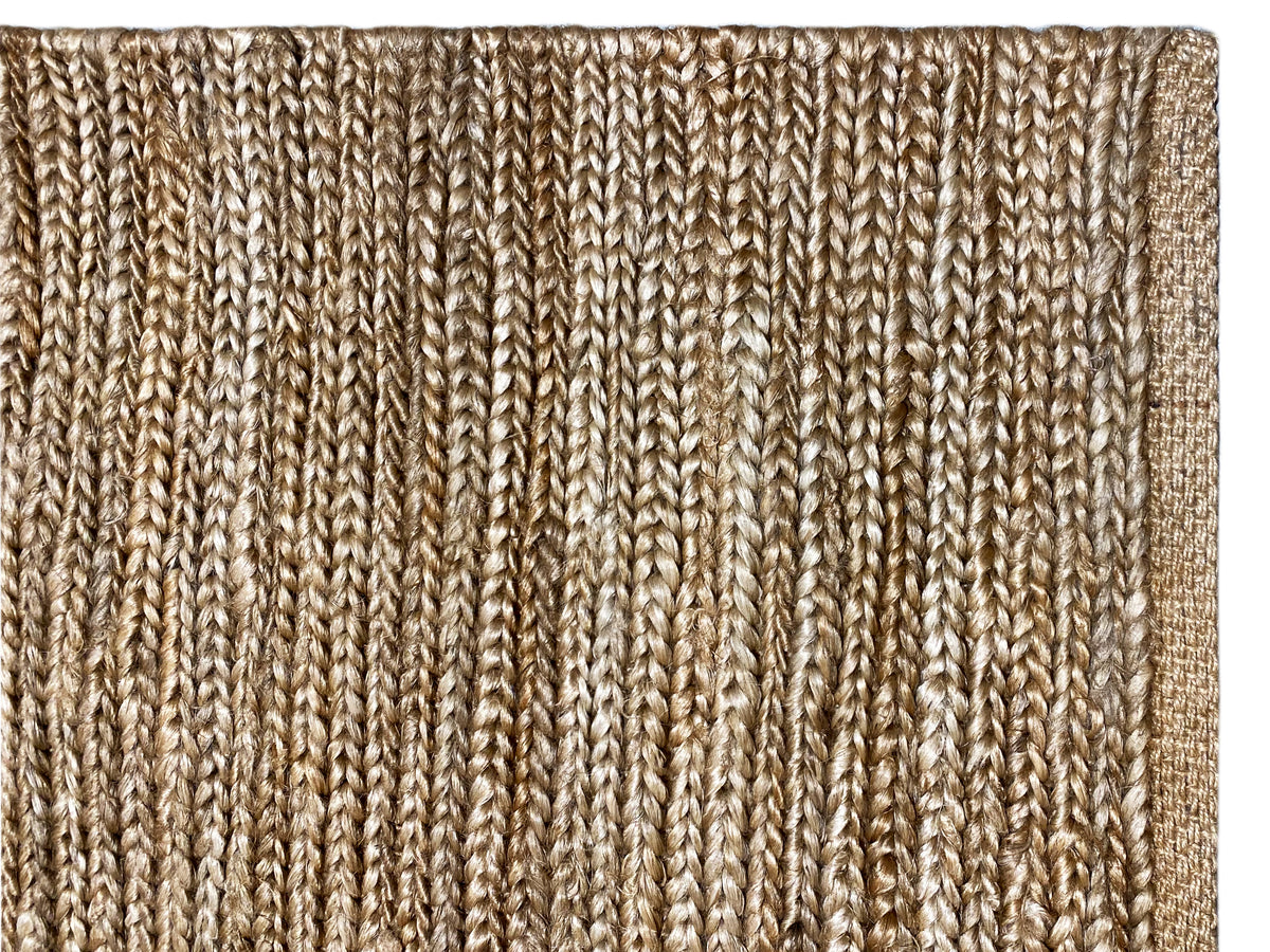 Carpet surface with a knitted look, mottled in beige and brown tones