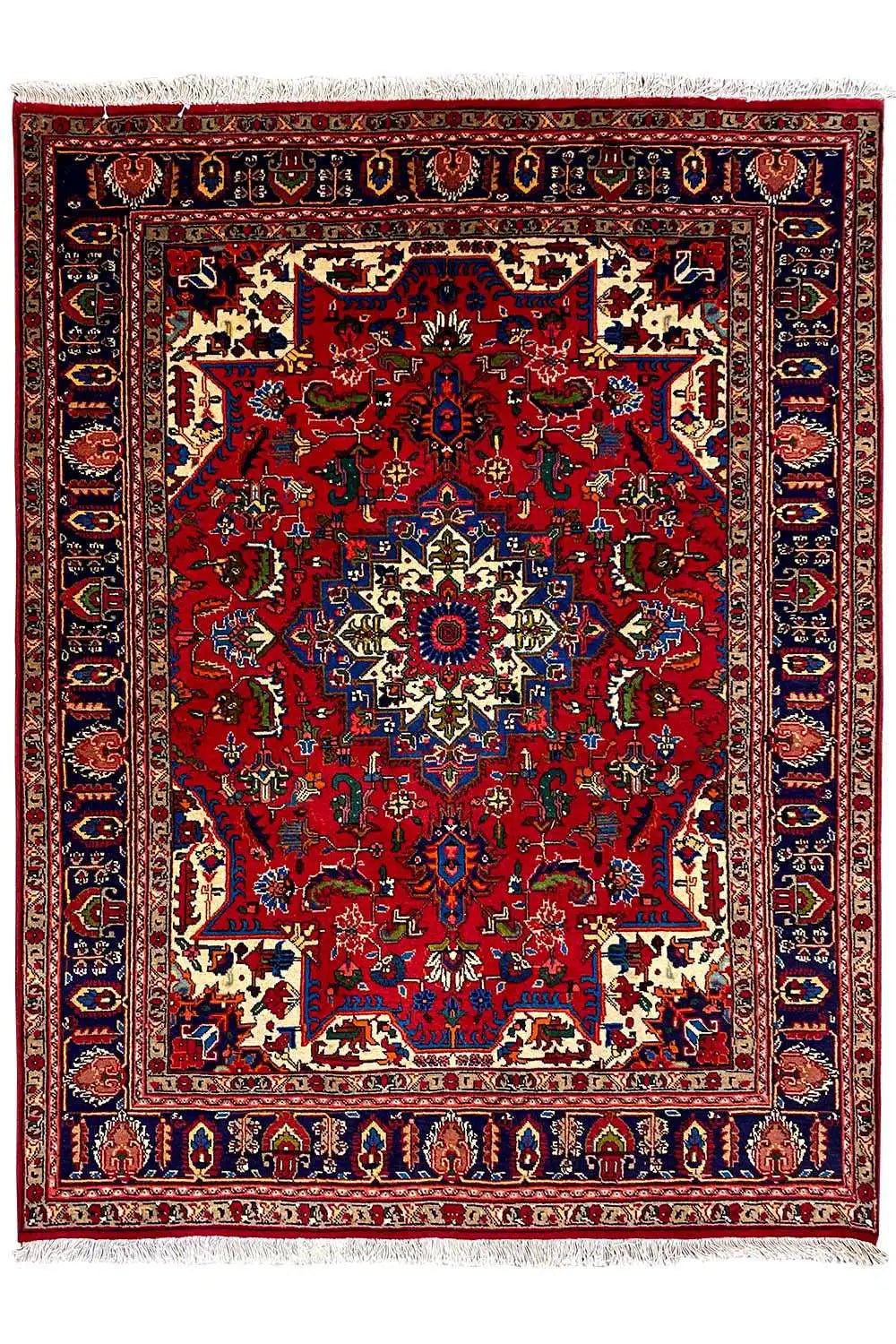 Red carpet with large ornamental fields, blue border, and central medallion