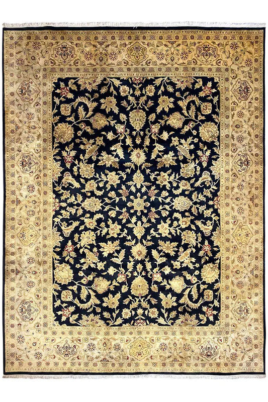 Rug with dark blue pile and a cream-colored border, ornamental floral pattern