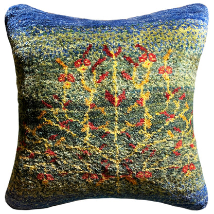 Wool cushion 40x40 cm with a blue cushion border and a colorful embroidered floral design