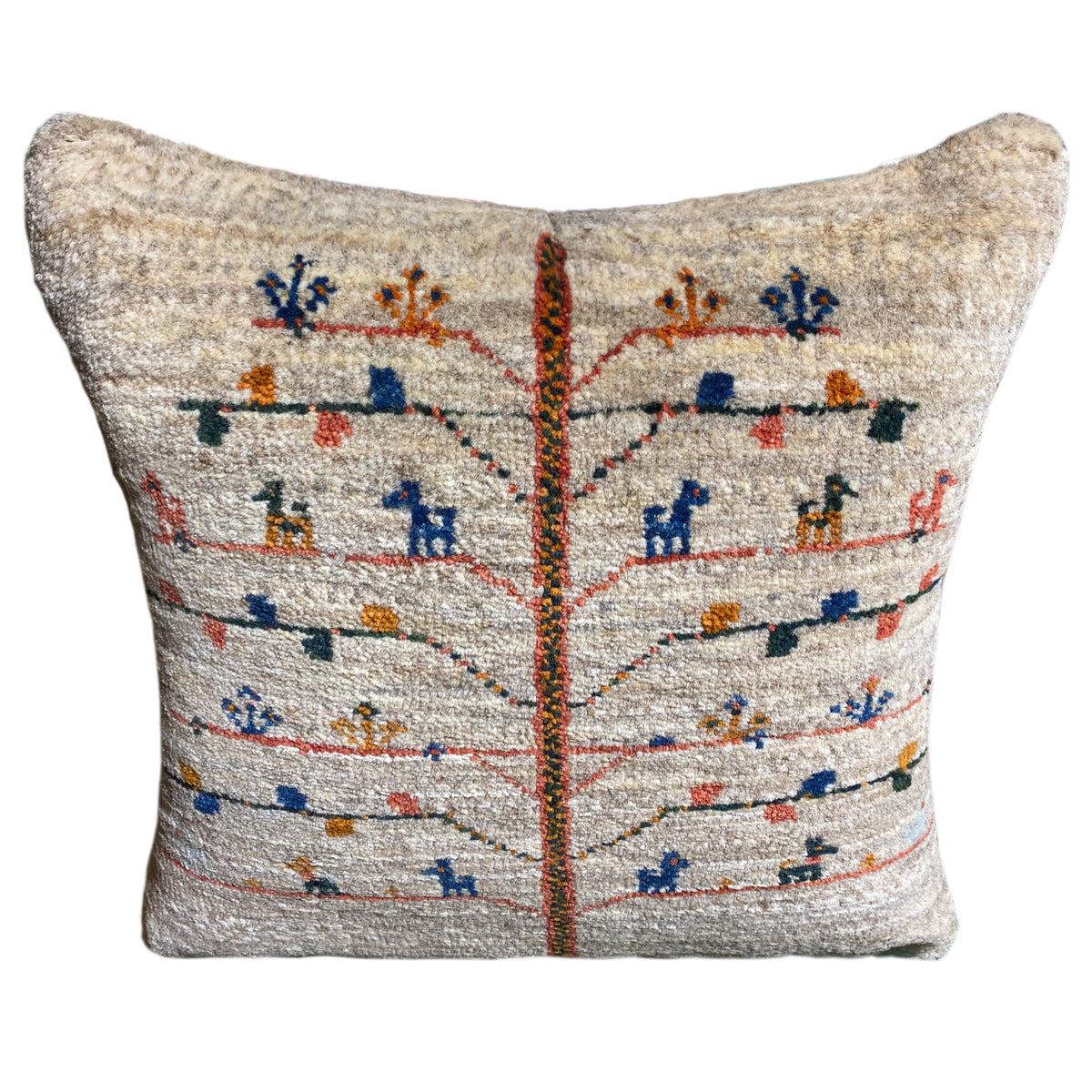Beige cushion 40x40 cm, back view with multicolored embroidery pattern and center seam
