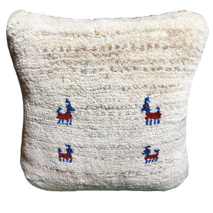 Wool cushion 40x40 cm, beige wool cover with four blue-and-red embroidered figures