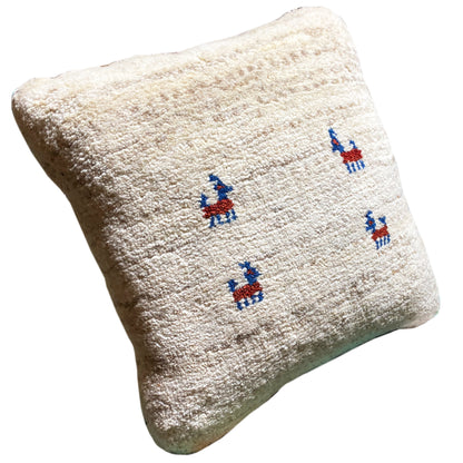 Wool cushion 40x40 cm, beige wool cover with blue-and-red embroidered figures in one corner