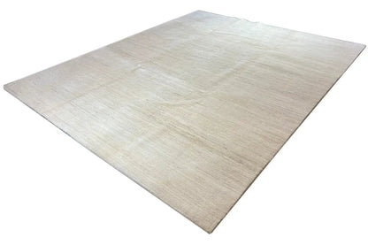 Light-colored Gabbeh rug with a delicate pattern, diagonal view