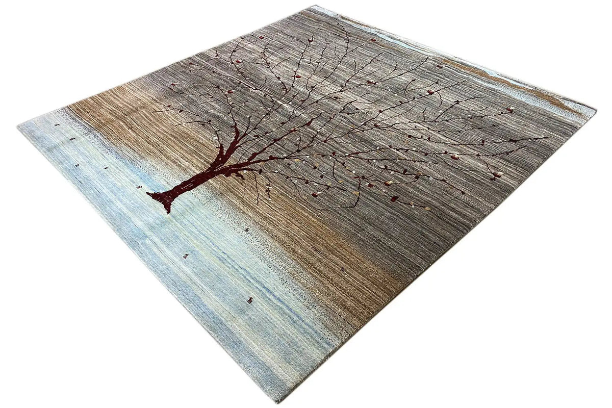 Gabbeh rug with tree motif and red lines, brown-gray with light blue.