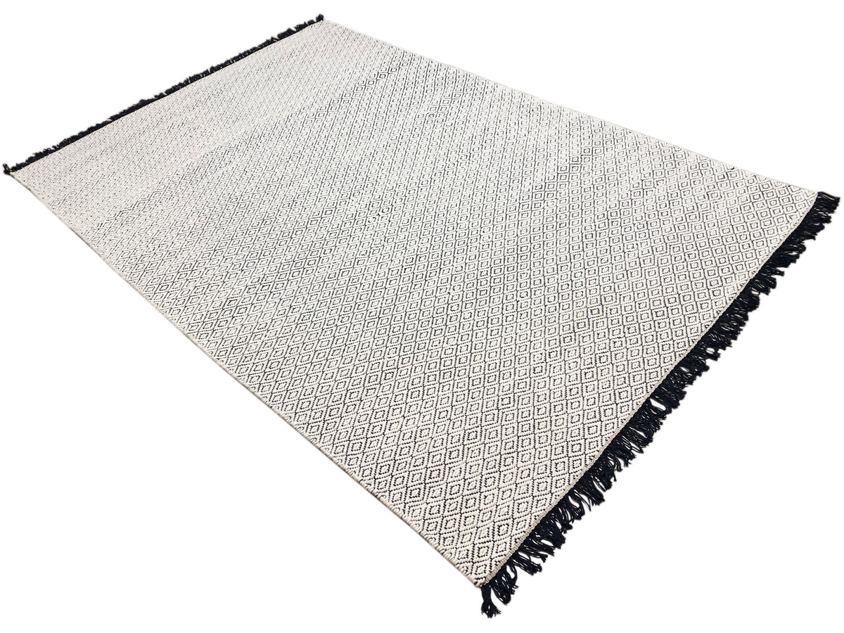 Kelim-Dhurrie-Teppich 160x230 cm, diagonal gefaltet, hellbeige mit dunklen Fransen
