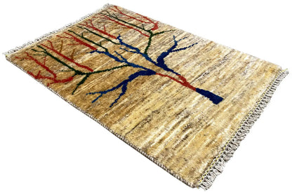 Gabbeh rug, angled, blue tree motif with red accents on a beige background, fringes